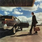 imgi 30 business traveler picking up rental car airport 1314467 26878