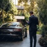 imgi 44 45yearold man suit looking his smartphone 1177187 137798