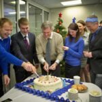 imgi 47 group people are cutting cake with knife 1309173 8916