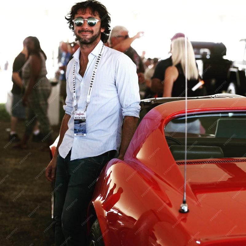 luxury limo transportation services in miami fl imgi 47 smiling young man standing by red car field 1637467 30